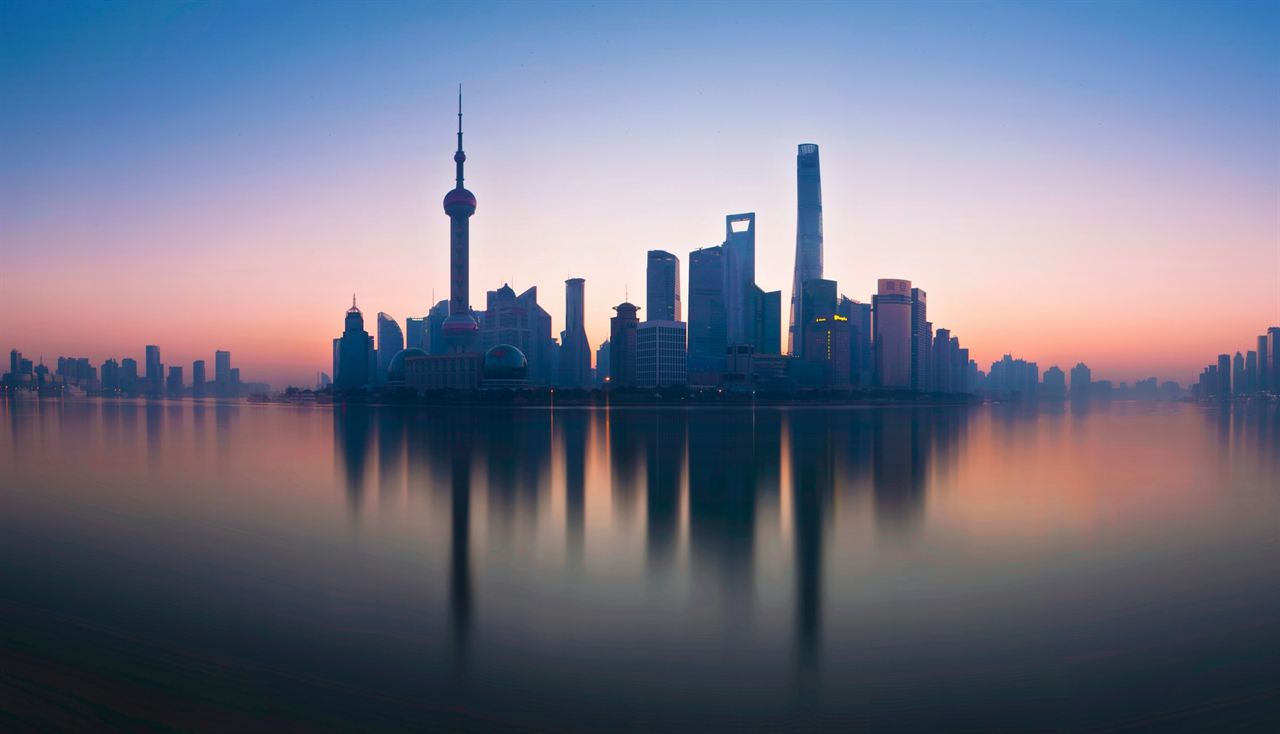 The Lujiazui skyline at dawn, reflected in the Huangpu River